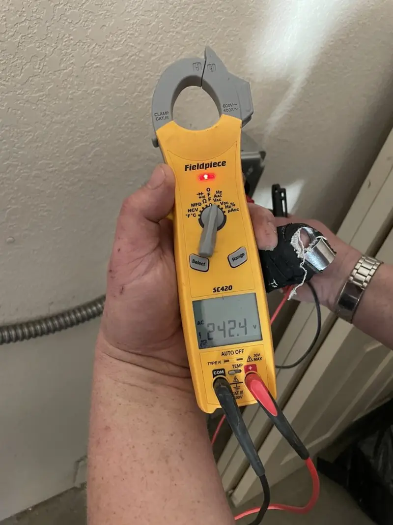 Voltage testing with clamp meter during Outlet Installation in Skowhegan